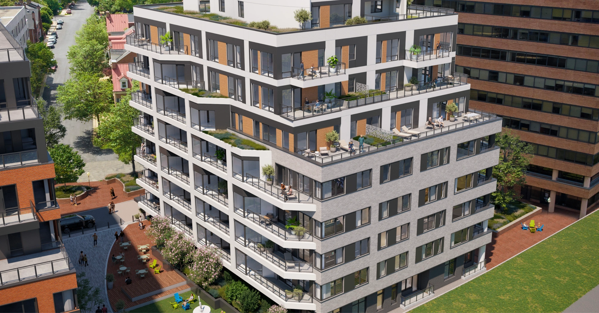 Modern multi-story residential building with spacious terraces and lush greenery throughout