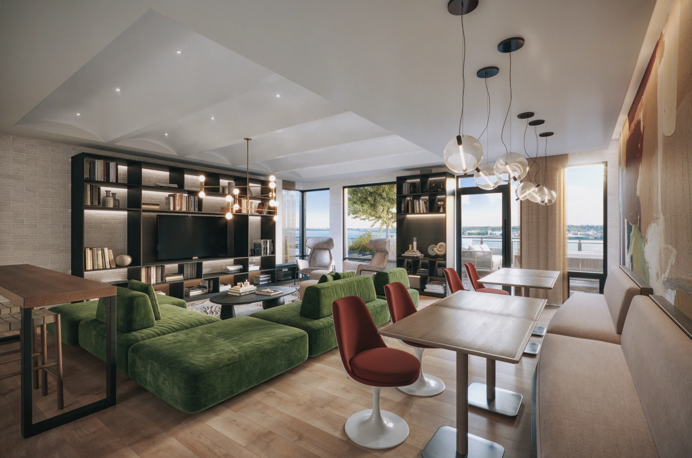 Cozy lounge area with green modular seating and expansive built-in bookcases