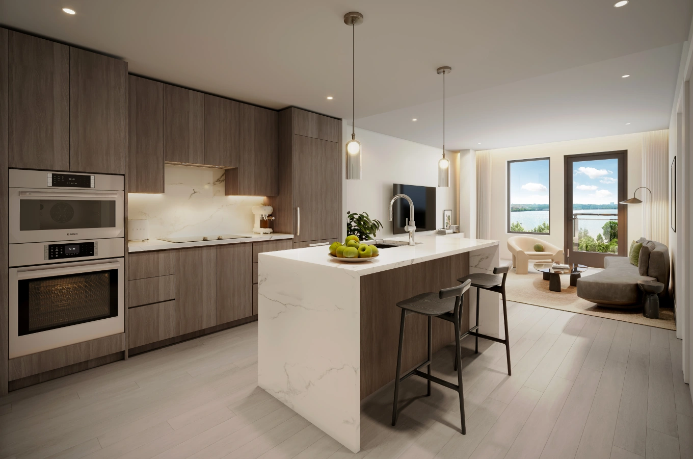 Modern open-concept kitchen with marble island and waterfront view in luxury residential apartment